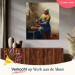 Melkmeisje van Johannes Vermeer gerestaureerde versie, met zonnestralen door raam.
