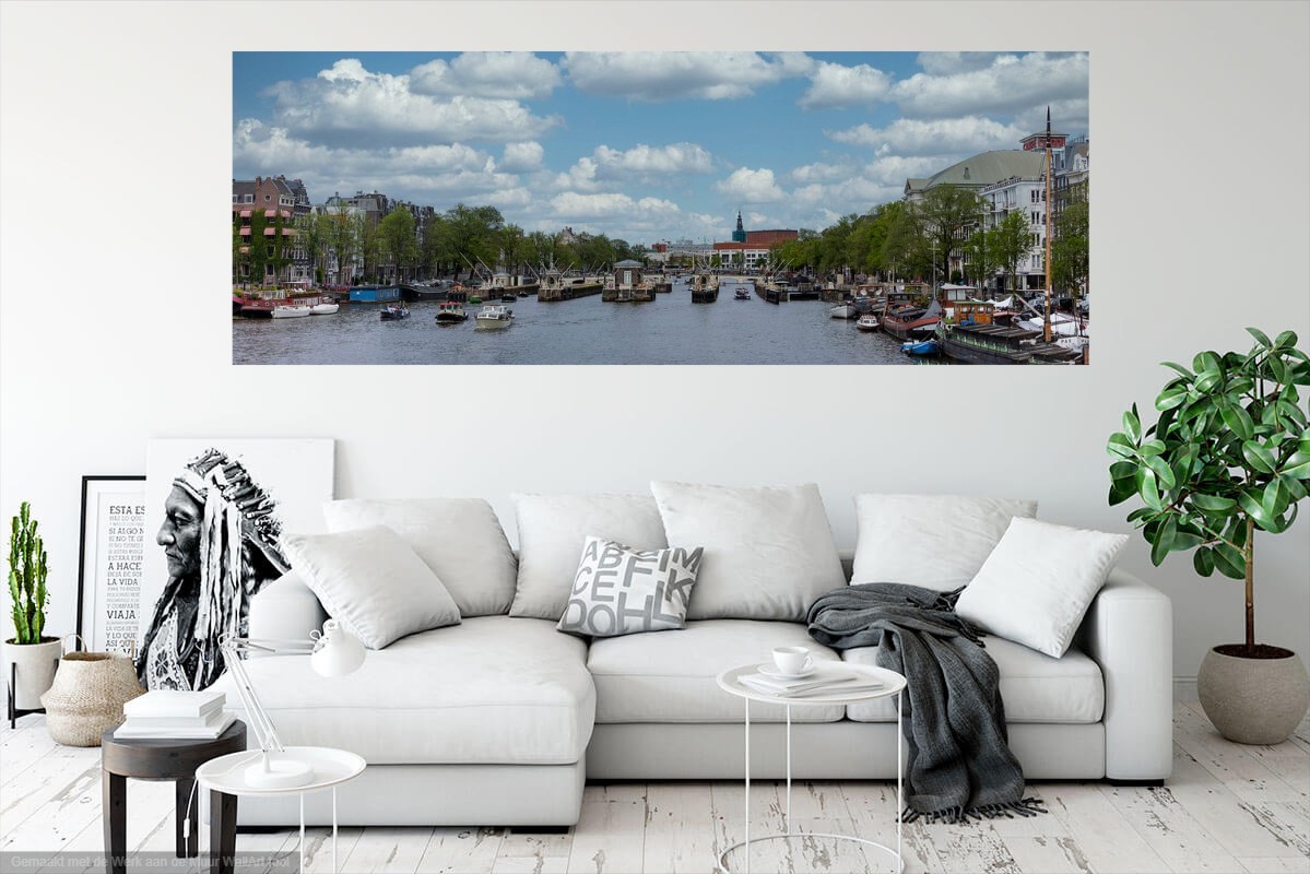 Brede panorama foto van de Magere Brug over de Amstel als wanddecoratie boven een lichte hoekbank - FotoAmsterdam