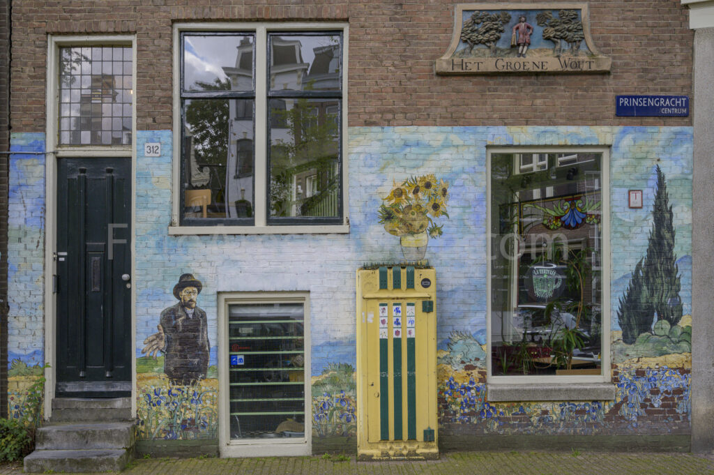 Historic painted façade with colourful artwork along the Prinsengracht