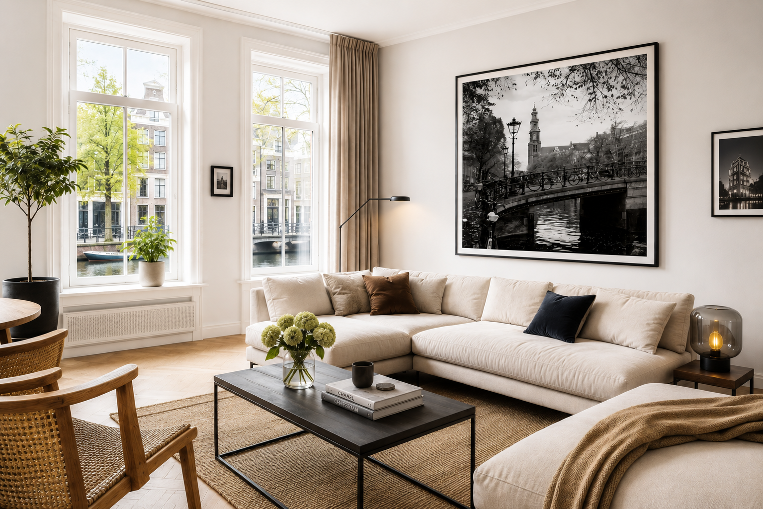 Large black and white Amsterdam wall art with the Westerkerk displayed in a bright living room